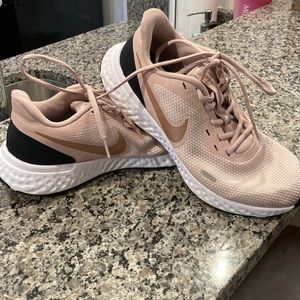 Pink Nike Women’s running shoes